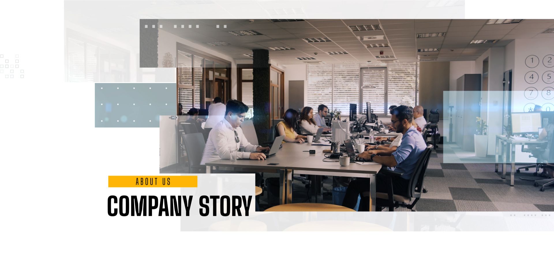 People working in the Stratis open air office sitting at the tables working on laptops
