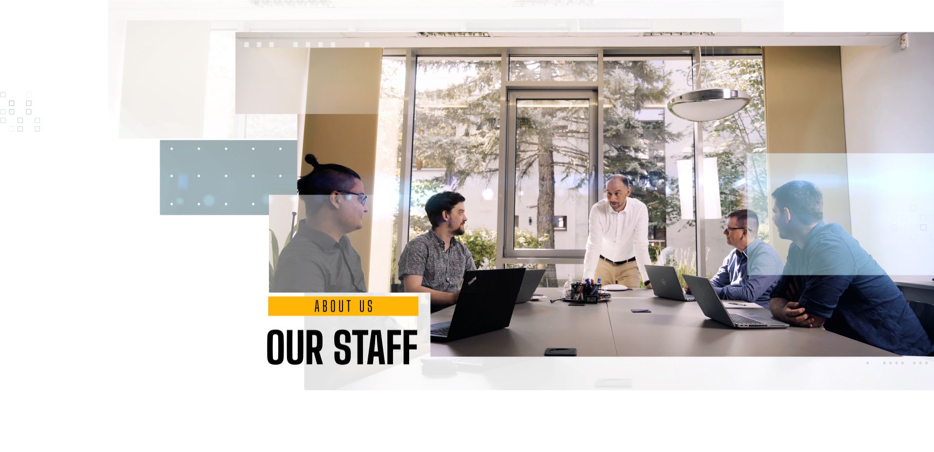 Business unit director holds a meeting with his team at the Stratis office